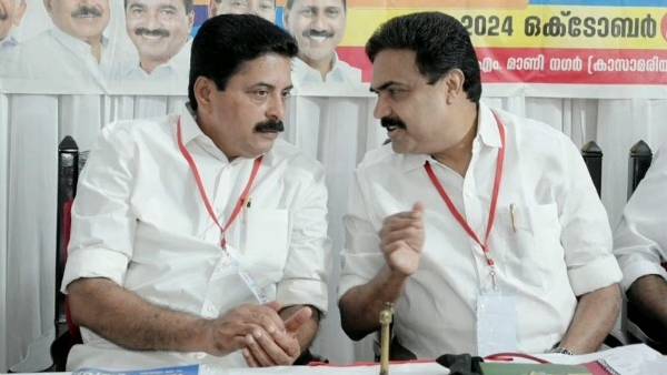 Kerala Congress leaders Roshy Augustine and Jose K Mani