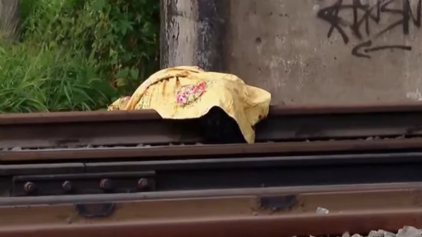 Womans body found in rail track