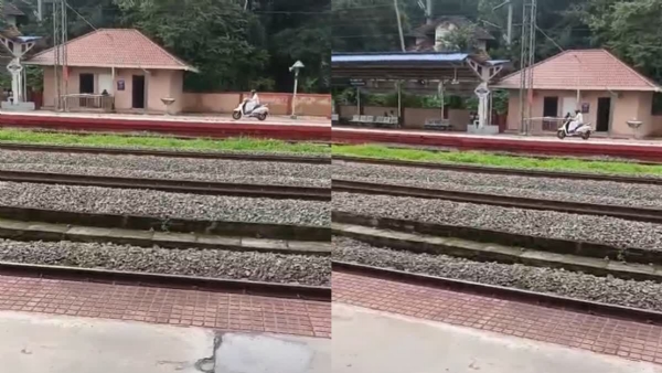 MAN RIDE SCOOTER ON PLATFORM