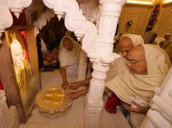 Flagpole and urn installation completed at Bapji M.S.A.s Guru Temple in Ahmedabad